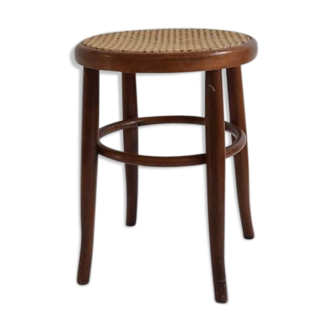 Curved wooden bistro and canne seating