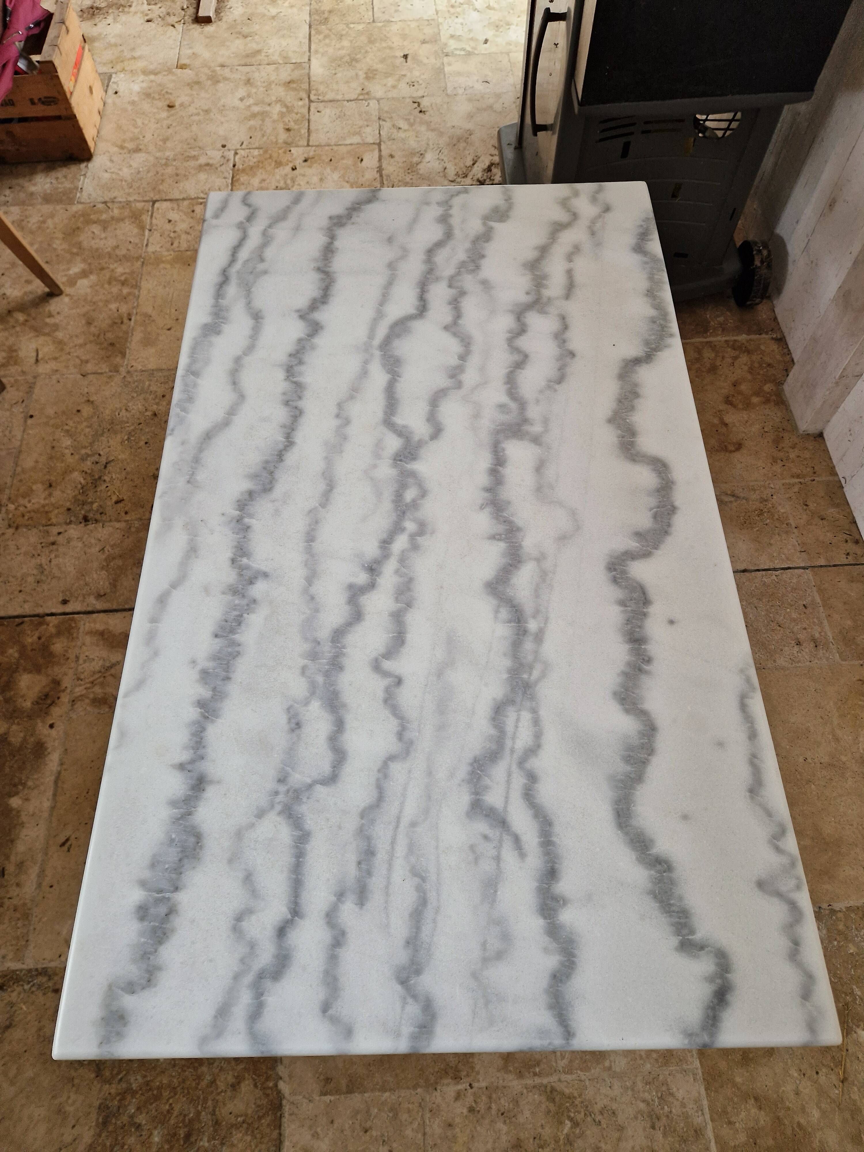 Bistro table with marble top and cast iron legs