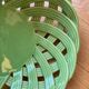 Green woven ceramic basket