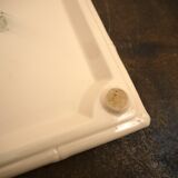 Digoin plate under pink earthenware