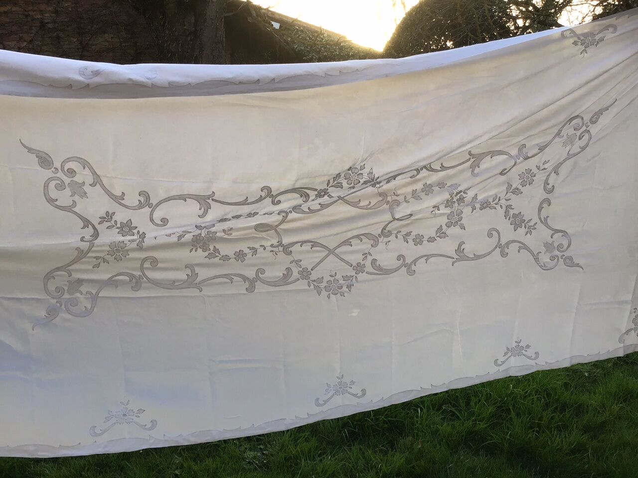 Large white ceremonial tablecloth