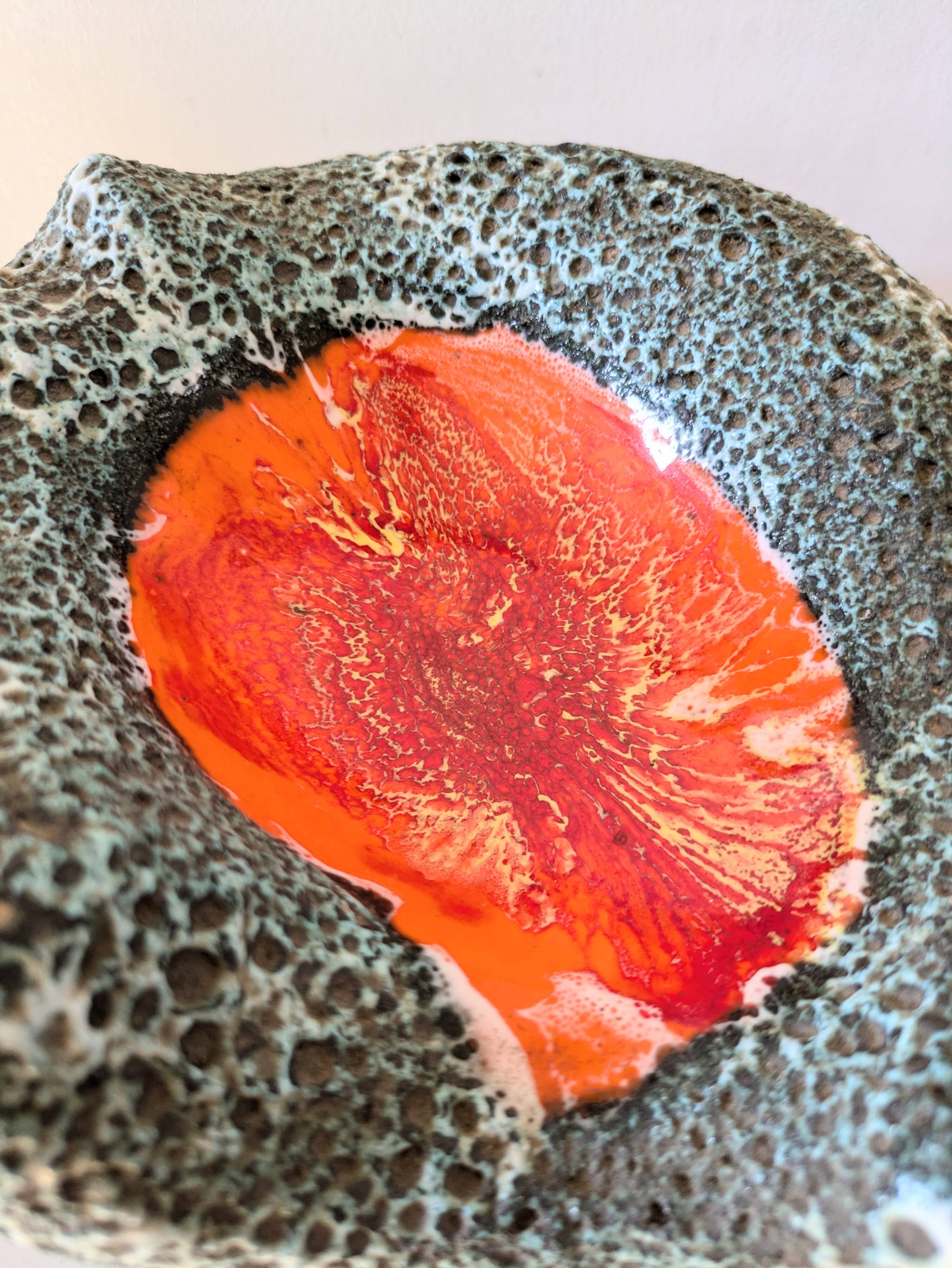 Volcanic lava pocket emptier, 70s design