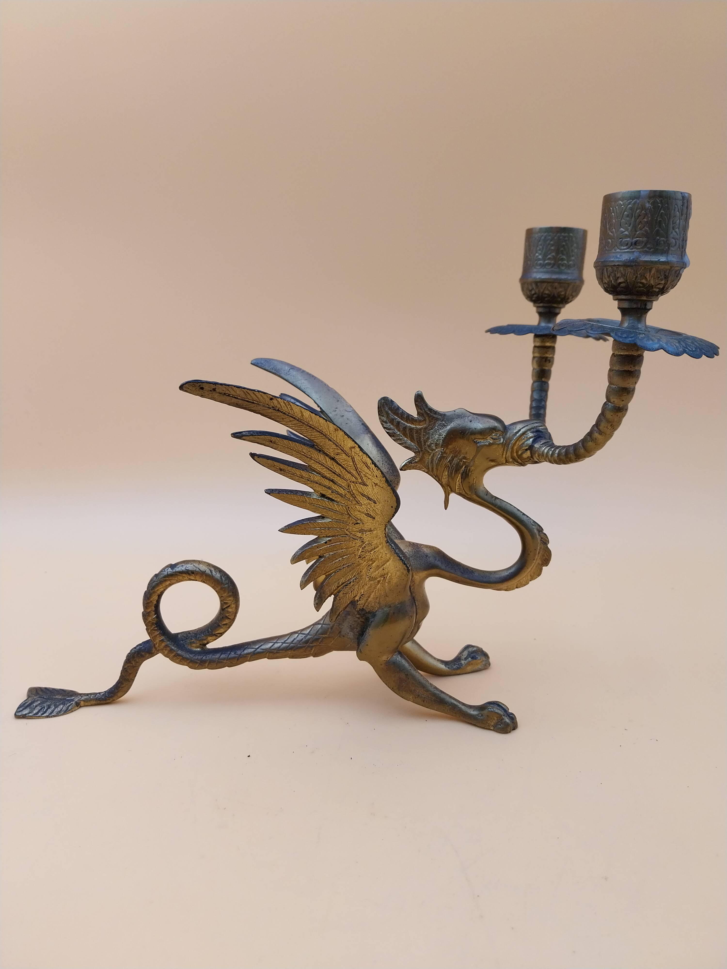 Pair of bronze candlesticks with chimera dragons
