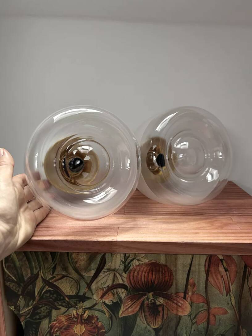 Pair of two-tone globe wall lights