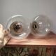 Paire d’appliques murales globes bicolores
