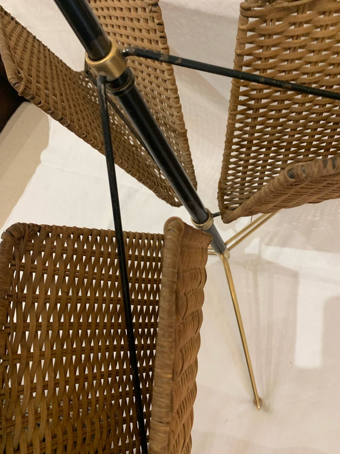 Wicker, iron, and brass magazine rack