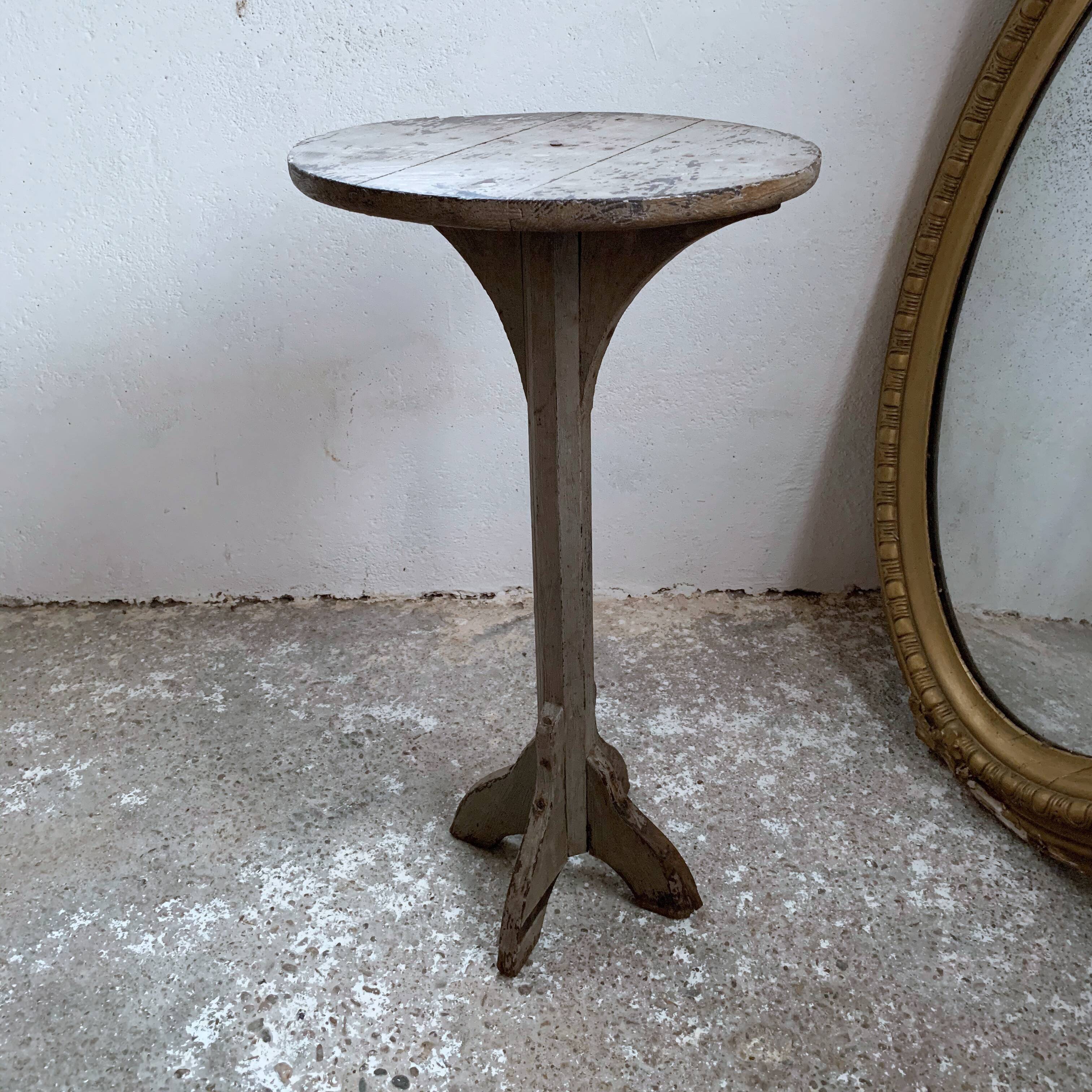 wooden pedestal or primitive winemaker's table