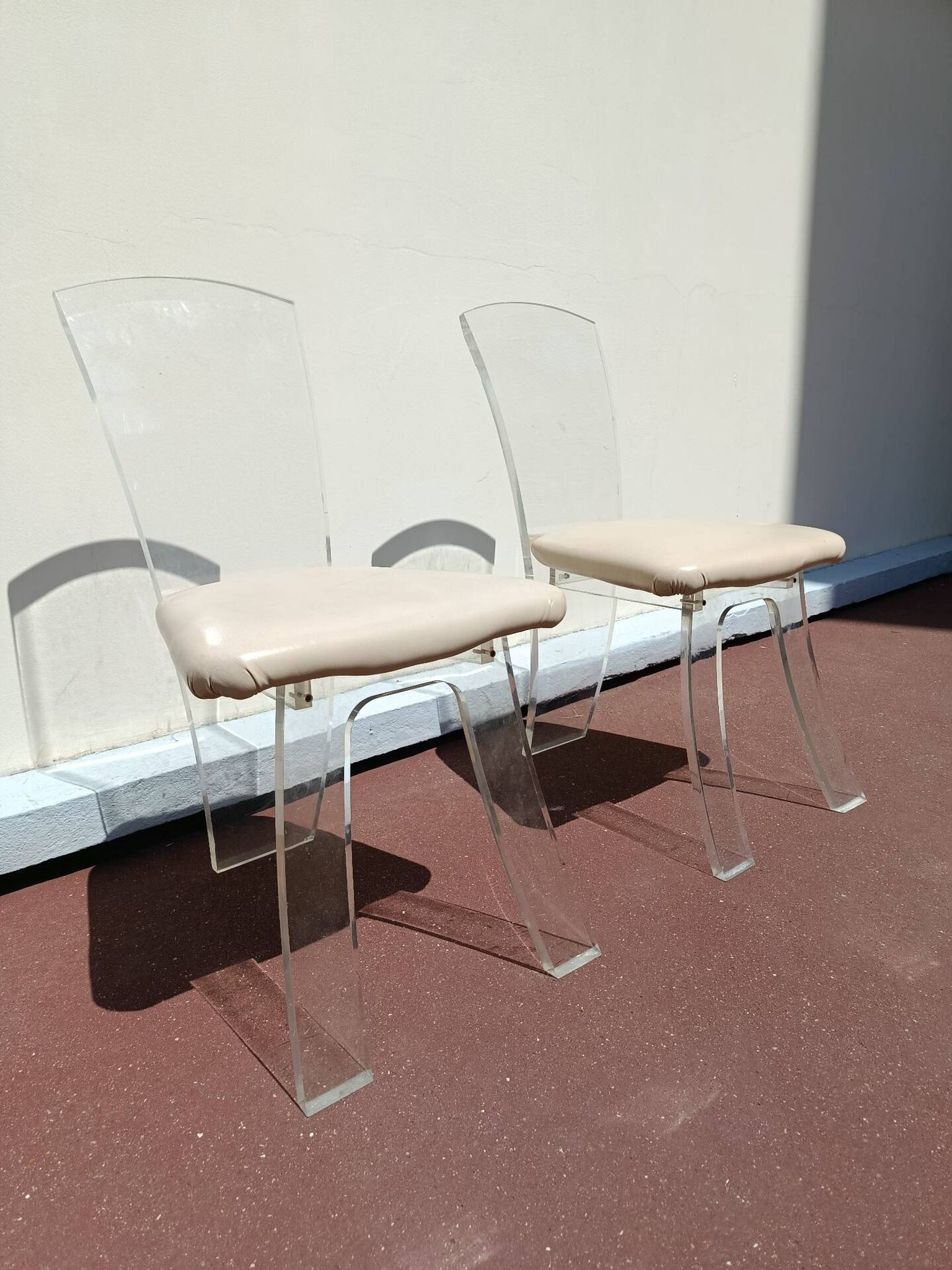 70s plexiglass chairs