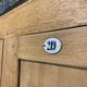 Old industrial cloakroom 1910 in oak and enamelled plate