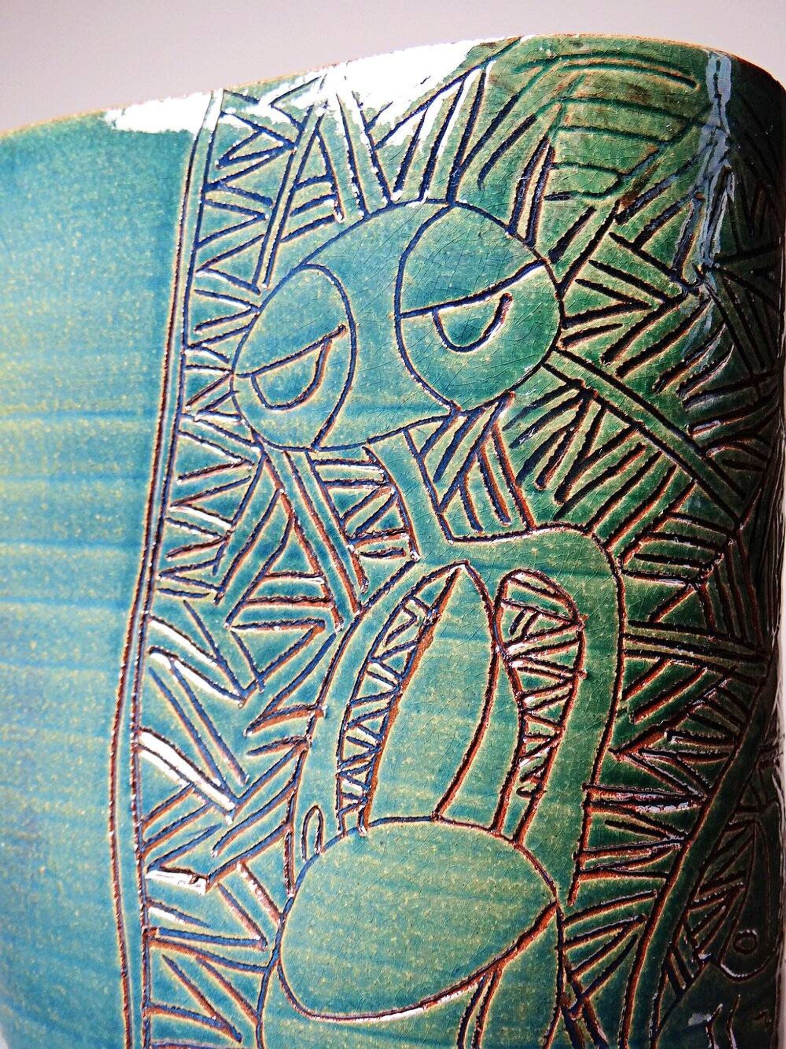 Vintage blue-green handcrafted pottery vase with incised tribal design by Eseka Pottery