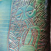 Vintage blue-green handcrafted pottery vase with incised tribal design by Eseka Pottery