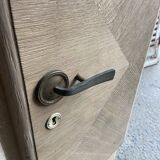 Raw wood chest of drawers with marble top