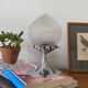 Antique lamp with a glass globe in Holophane style and chrome metal.