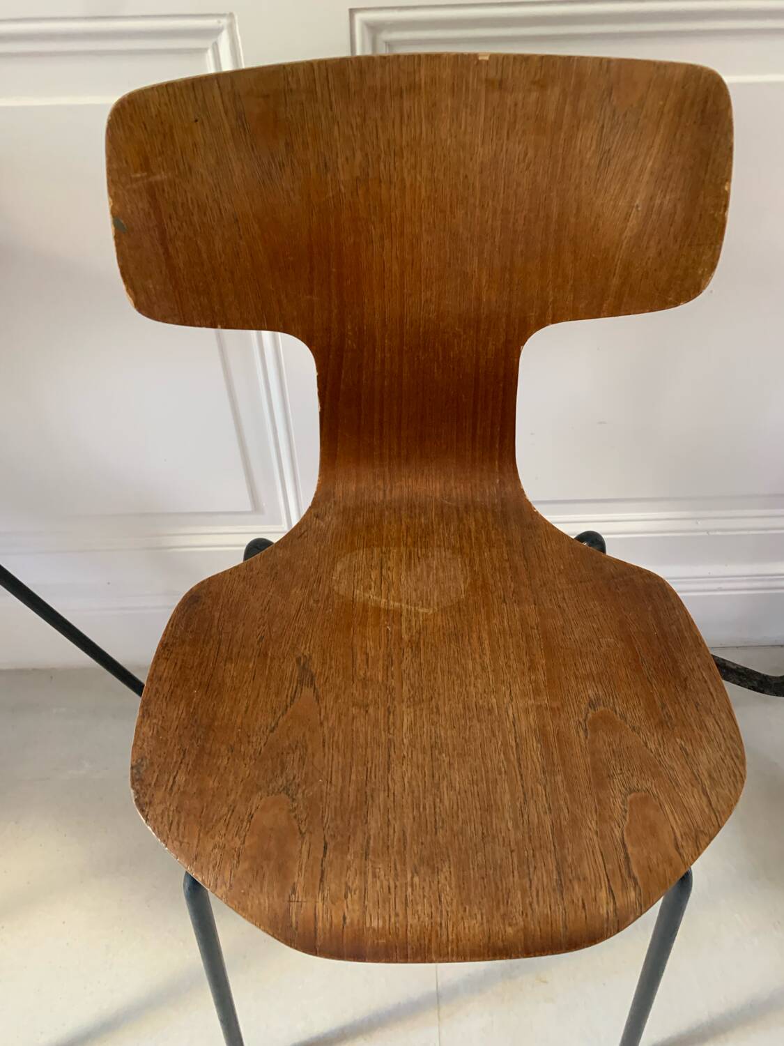 Two Arne Jacobsen "hammer" chairs