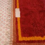 Minimalist burgundy cherry red shaggy berber rug