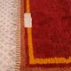 Minimalist burgundy cherry red shaggy berber rug