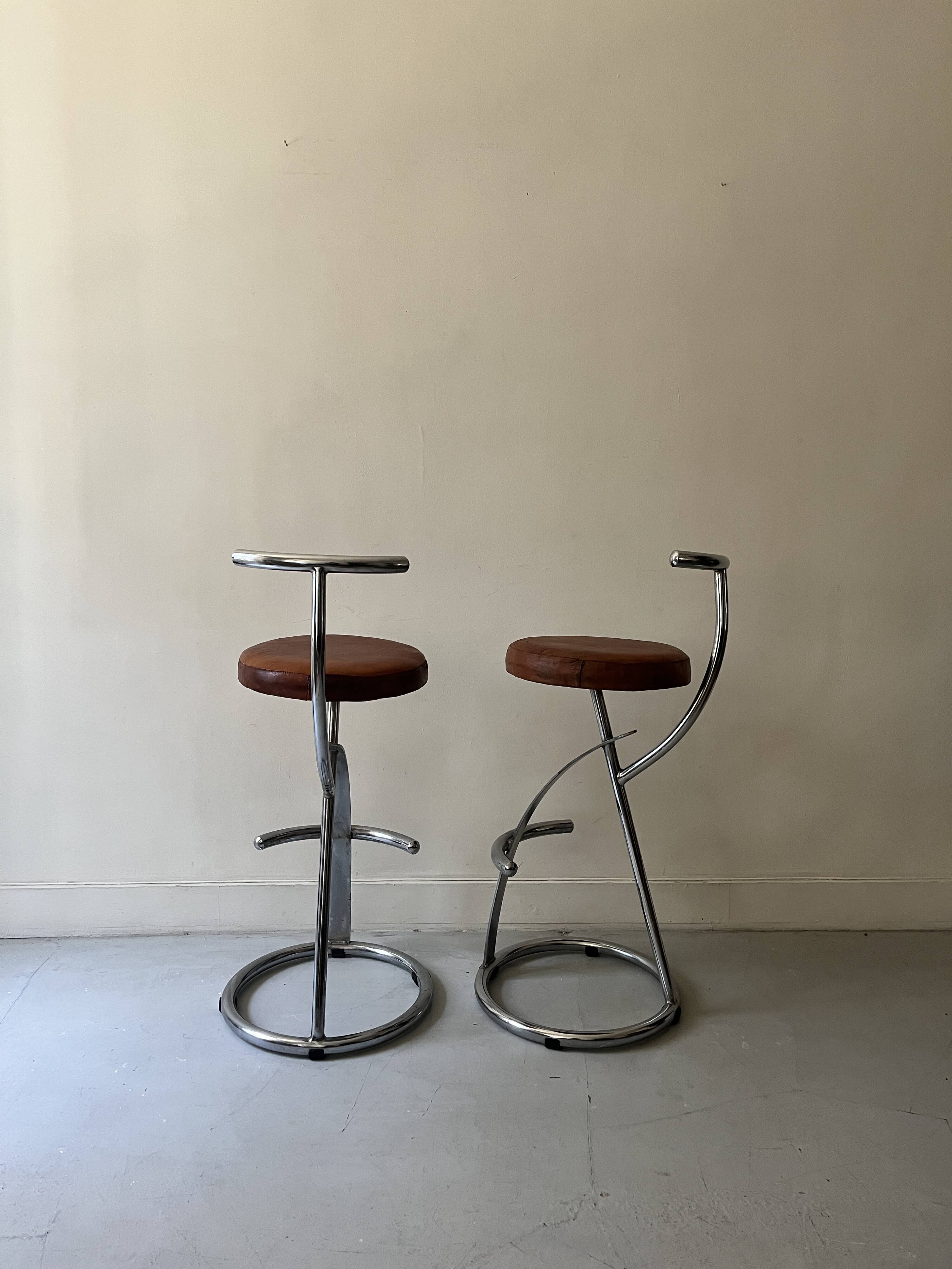 Bar stools in tubular chrome and tan leather, 1970s