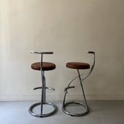 Bar stools in tubular chrome and tan leather, 1970s