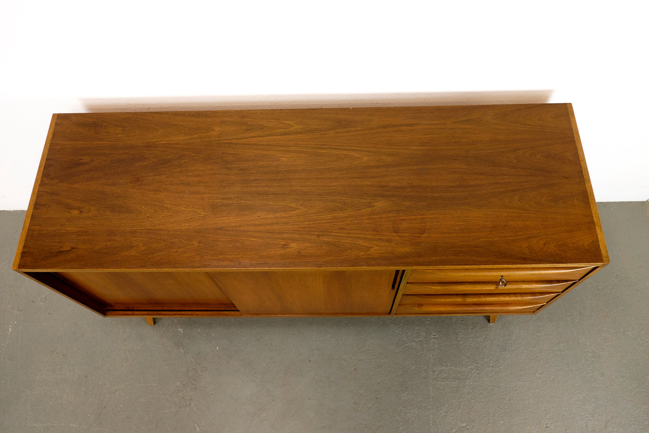 Midcentury Walnut Sideboard with sliding doors and drawers, 1950s
