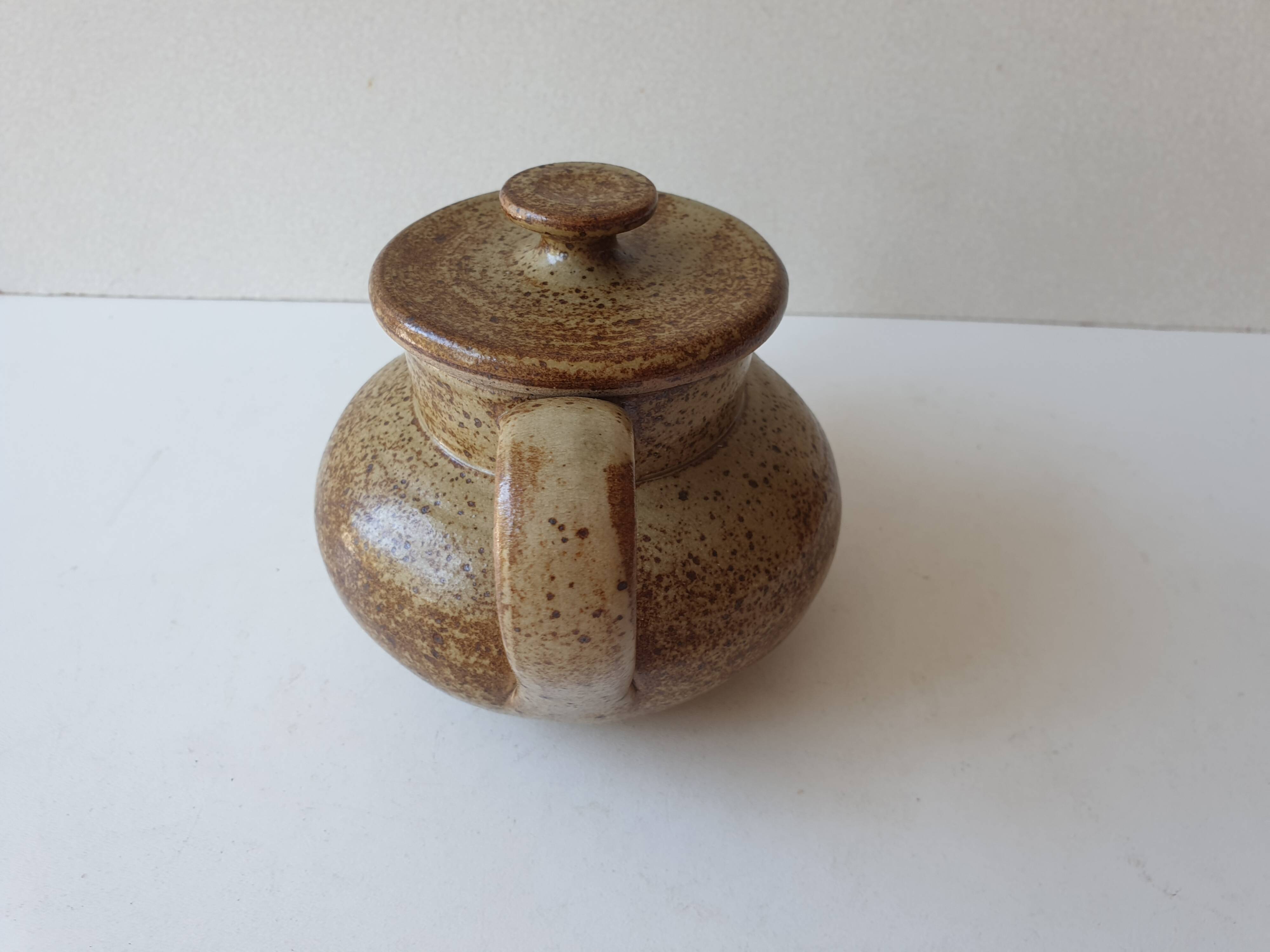 Small teapot in pyrite stoneware ceramic signed NC (Signature to be identified)