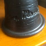 Ceramic pitcher shape candlestick, black color and signed at its base Jean Marais