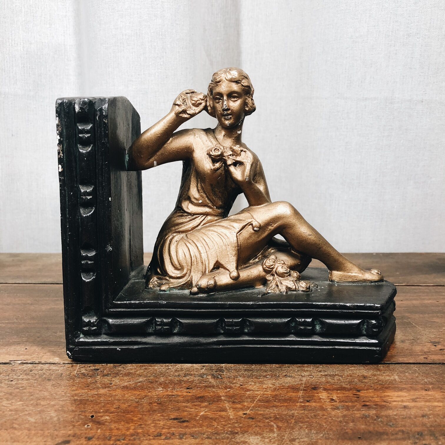 Old book clamps in black & gold plaster