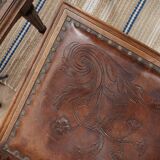Set of 4 Louis XVI style chairs in carved wood and embossed leather.