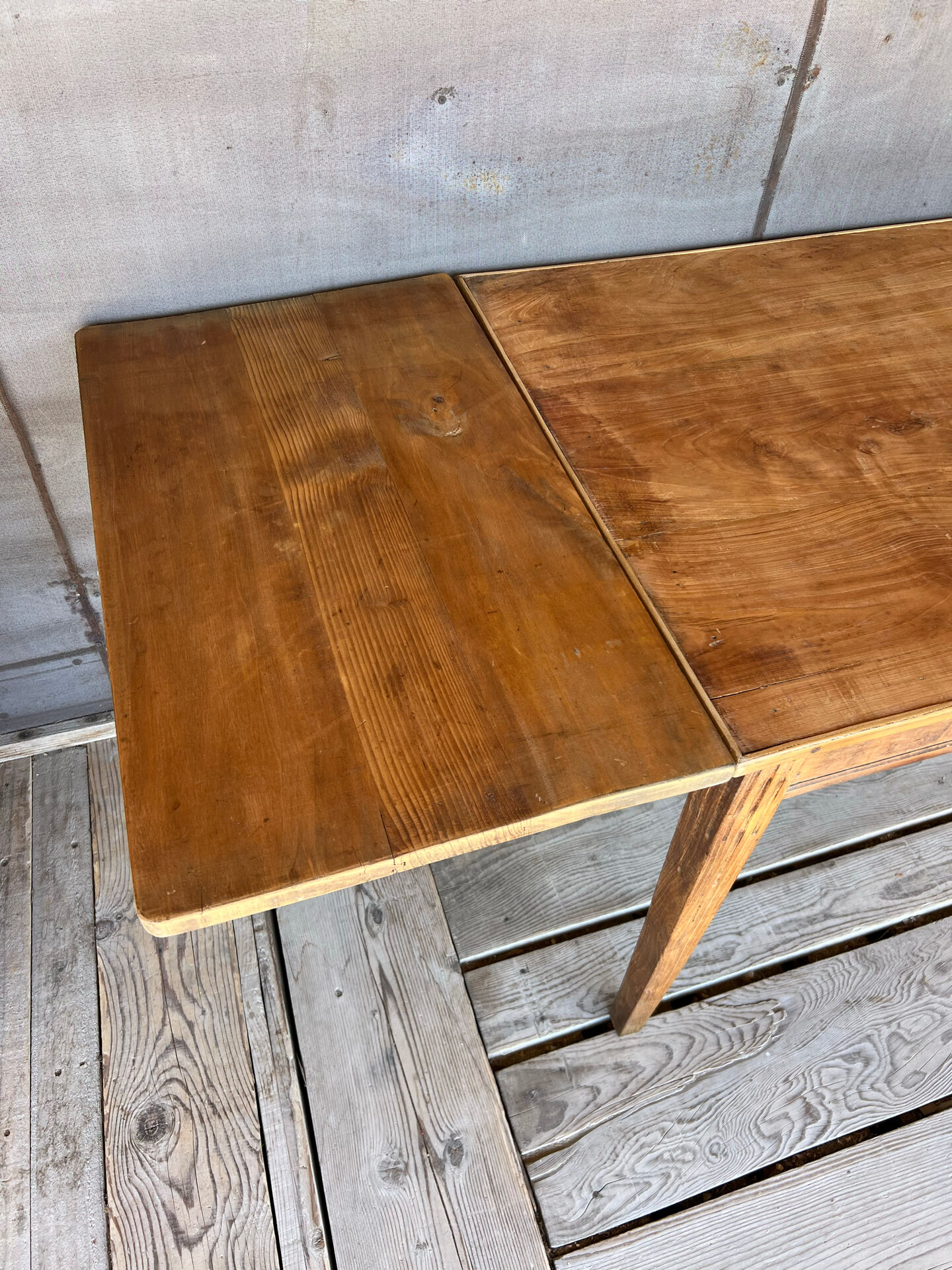 Old raw wood table with extension