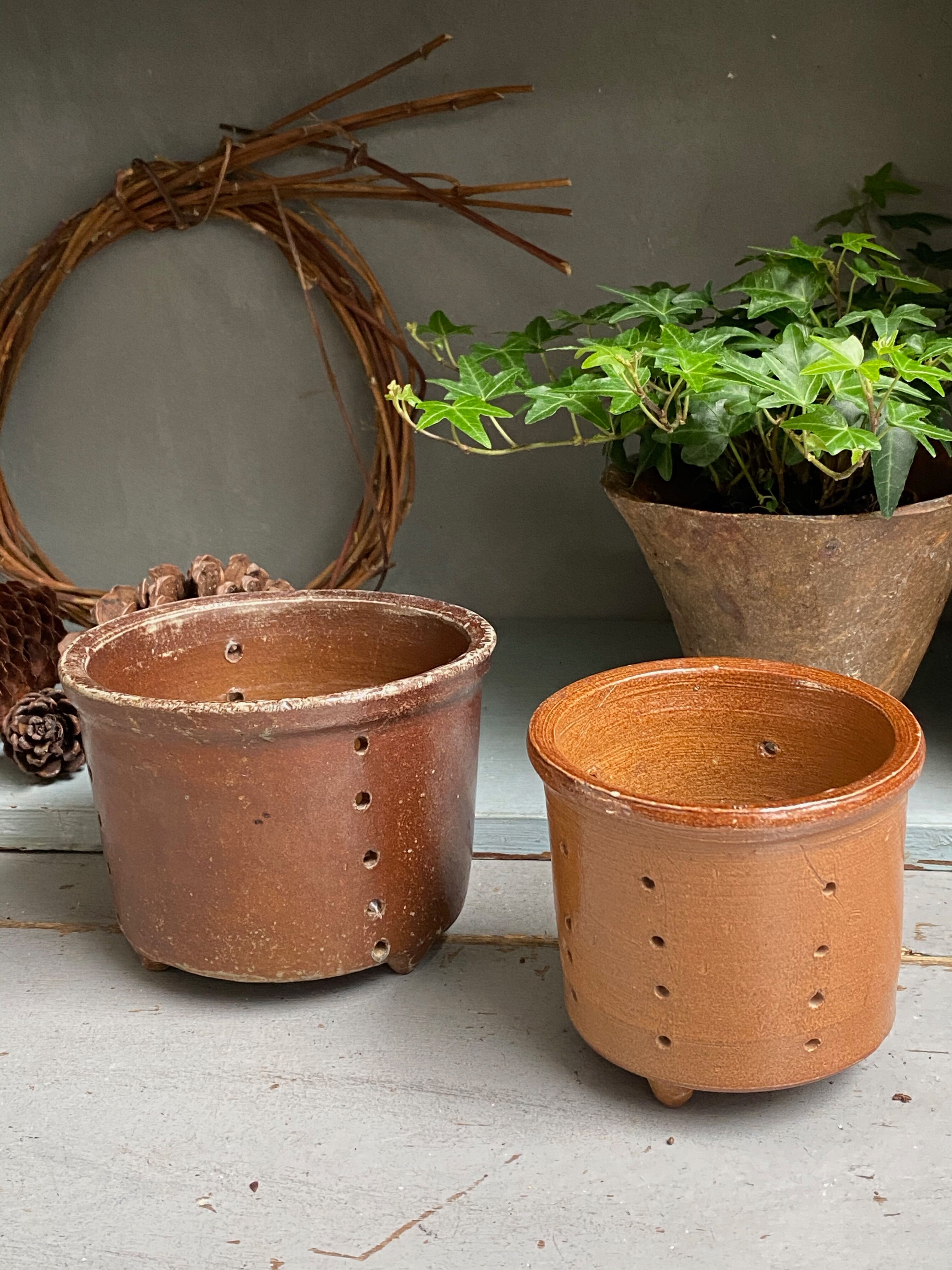 Pair of old faisselle molds