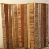 Straw and woven rope screen with metal structure