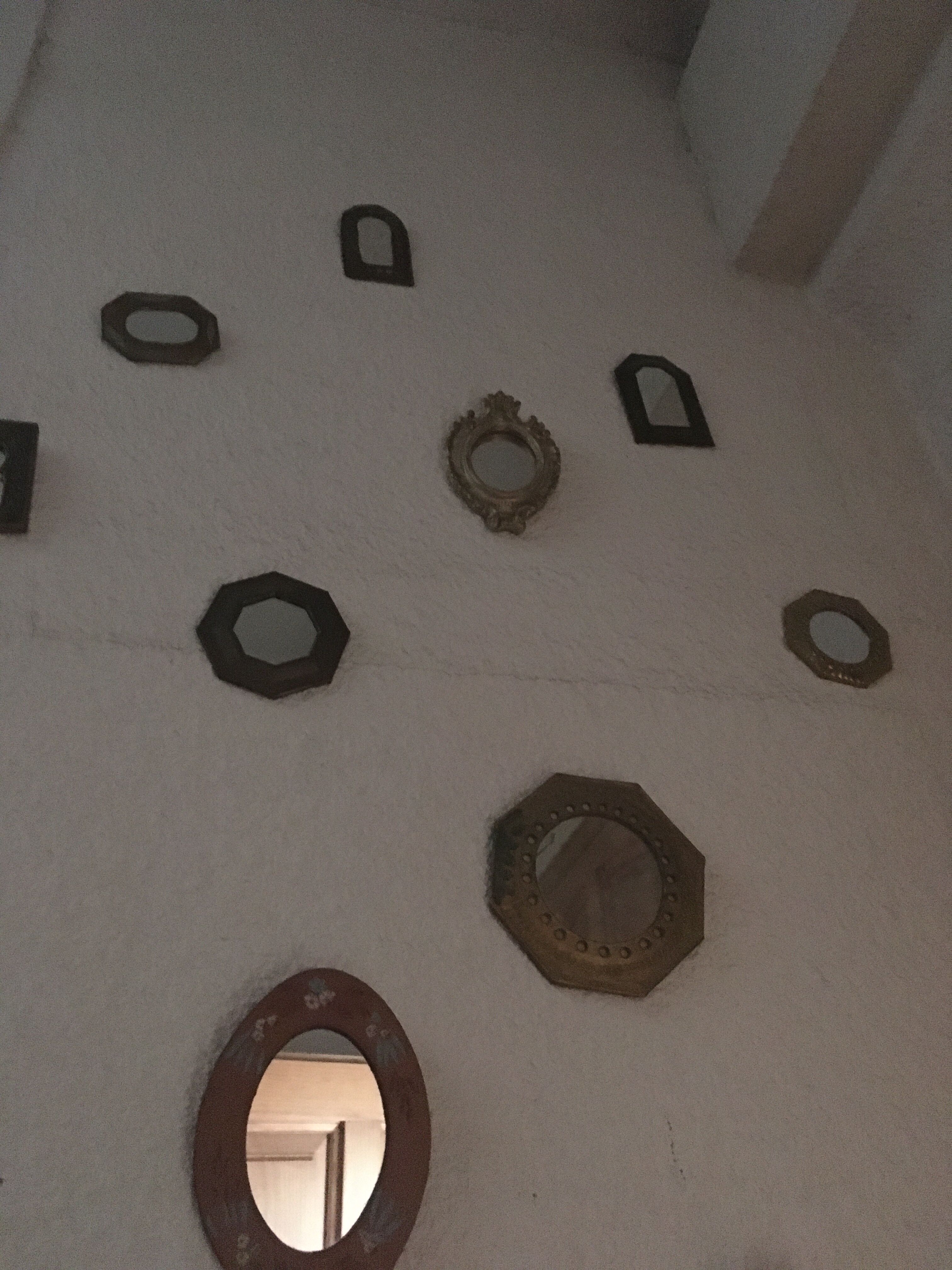 Ethnic brass mirrors.
