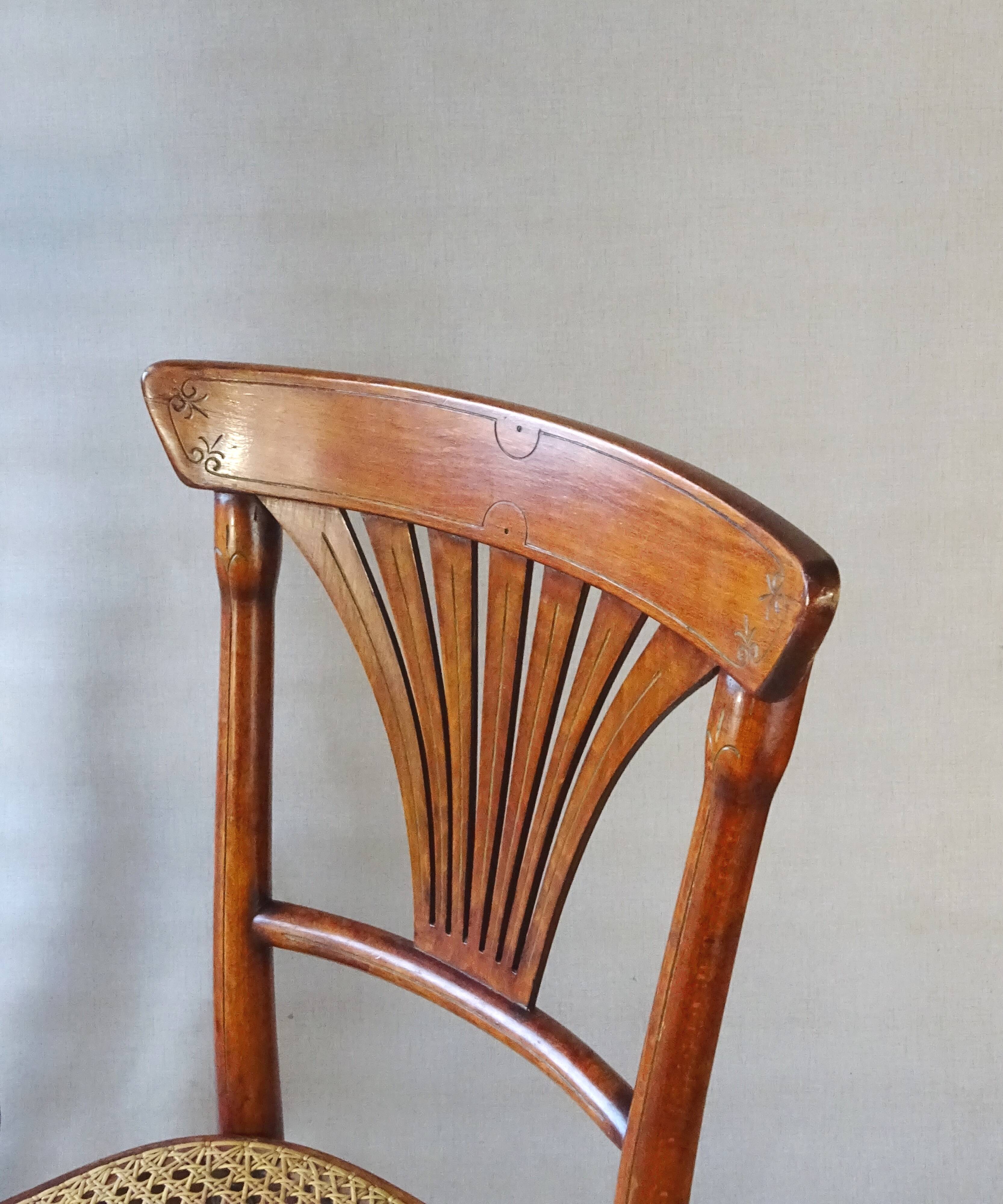 2 Thonet N°221 chairs, caned Art Nouveau bronze decor