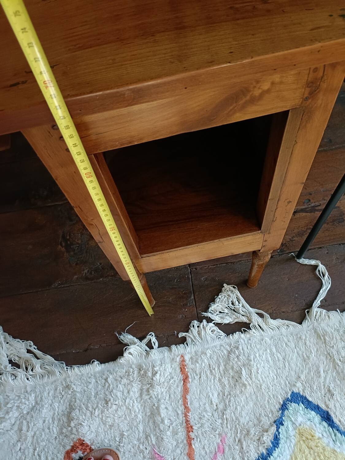 Open wooden bedside table