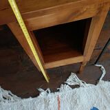 Open wooden bedside table