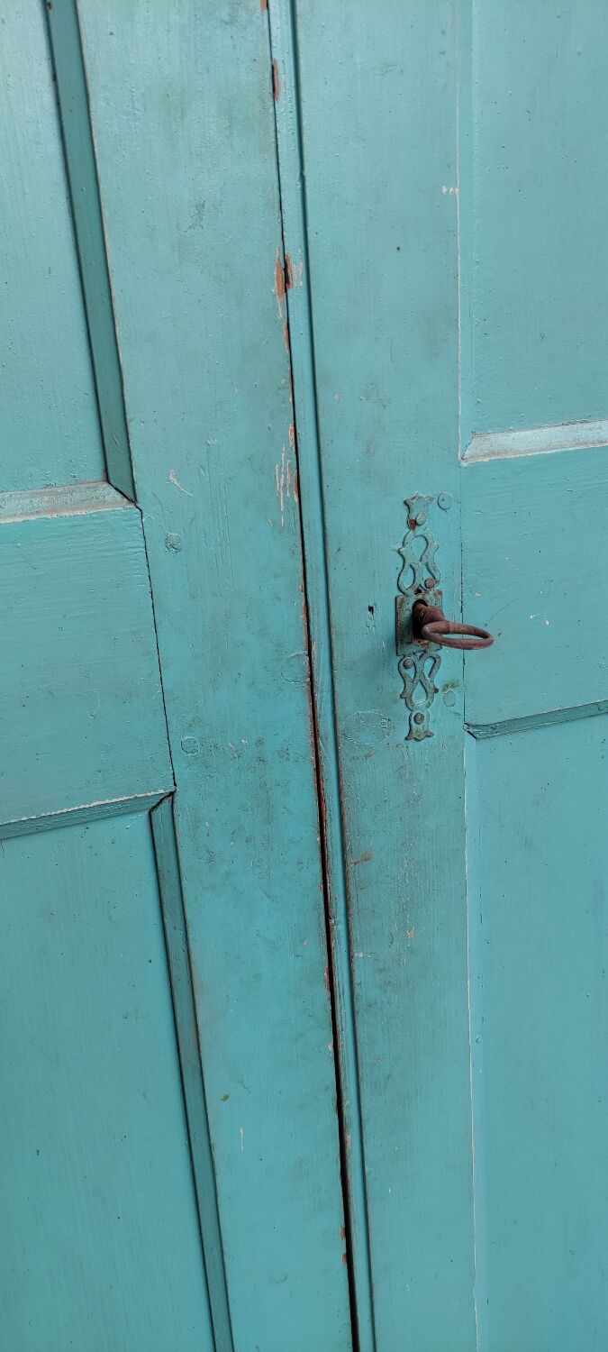 Antique patinated two-door cabinet