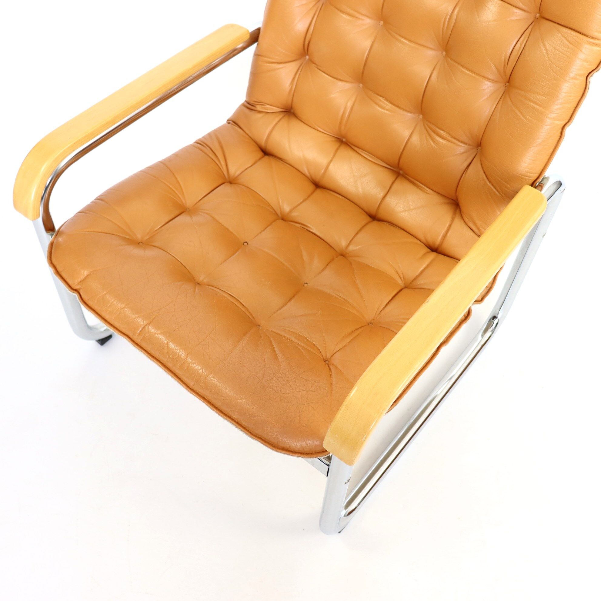 Leather and chrome armchair 70s