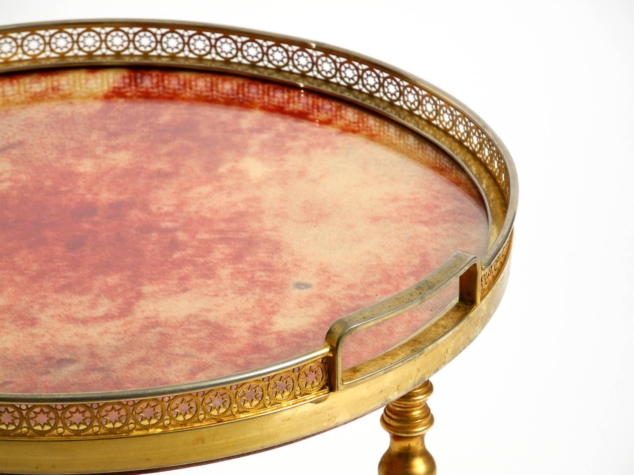 Round, small 1960s Aldo Tura serving or bar trolley in red goatskin leather
