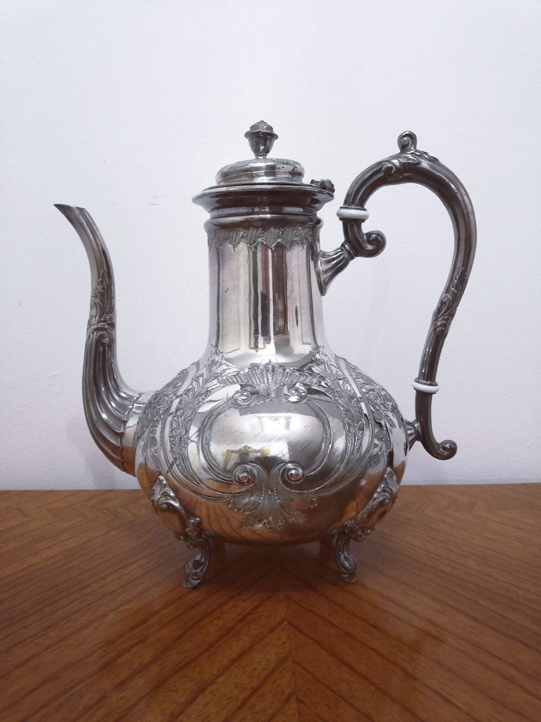 Silver metal teapot in Louis XV style