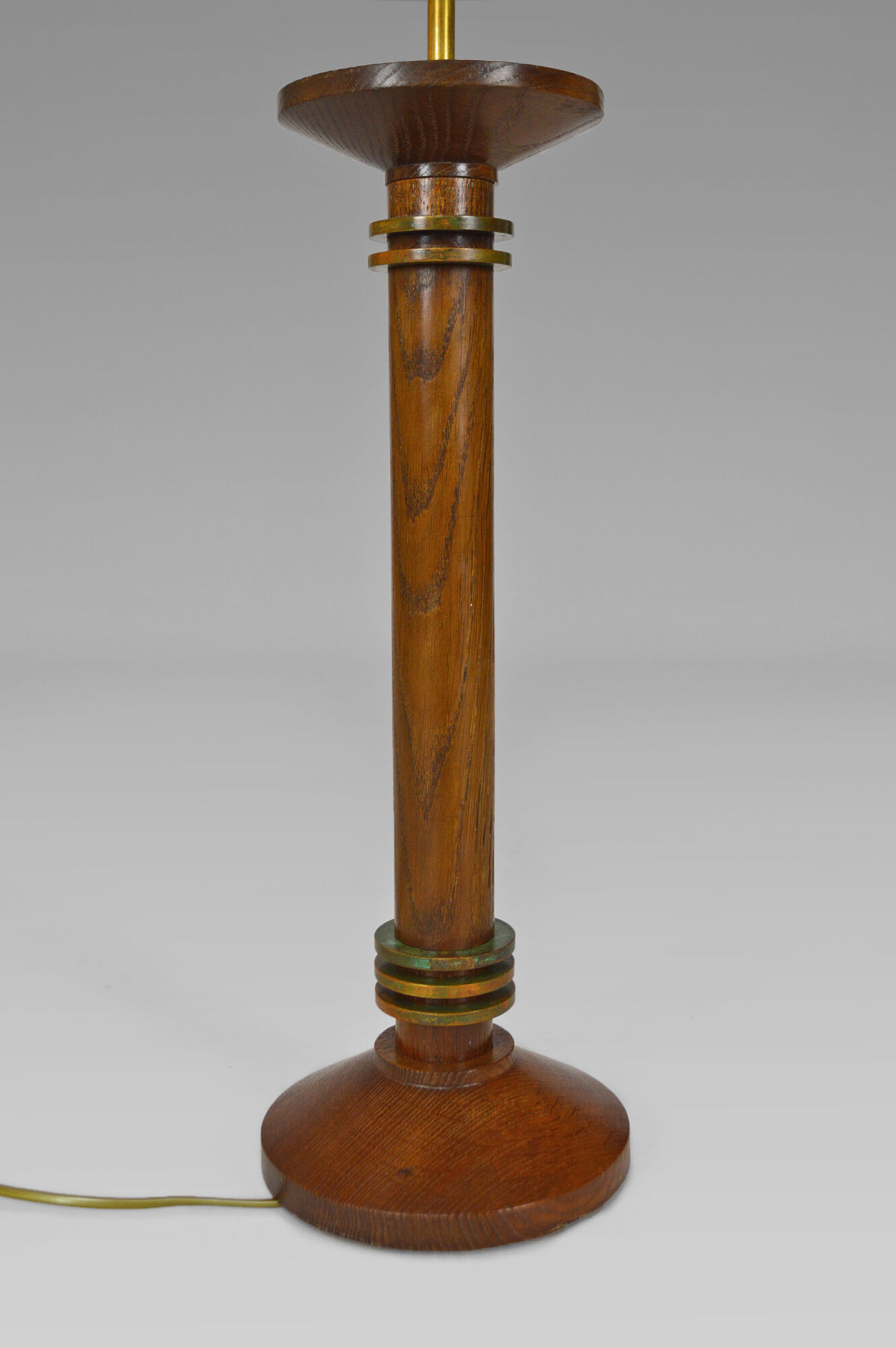 Pair of art deco lamps in wood and patinated bronze around 1930