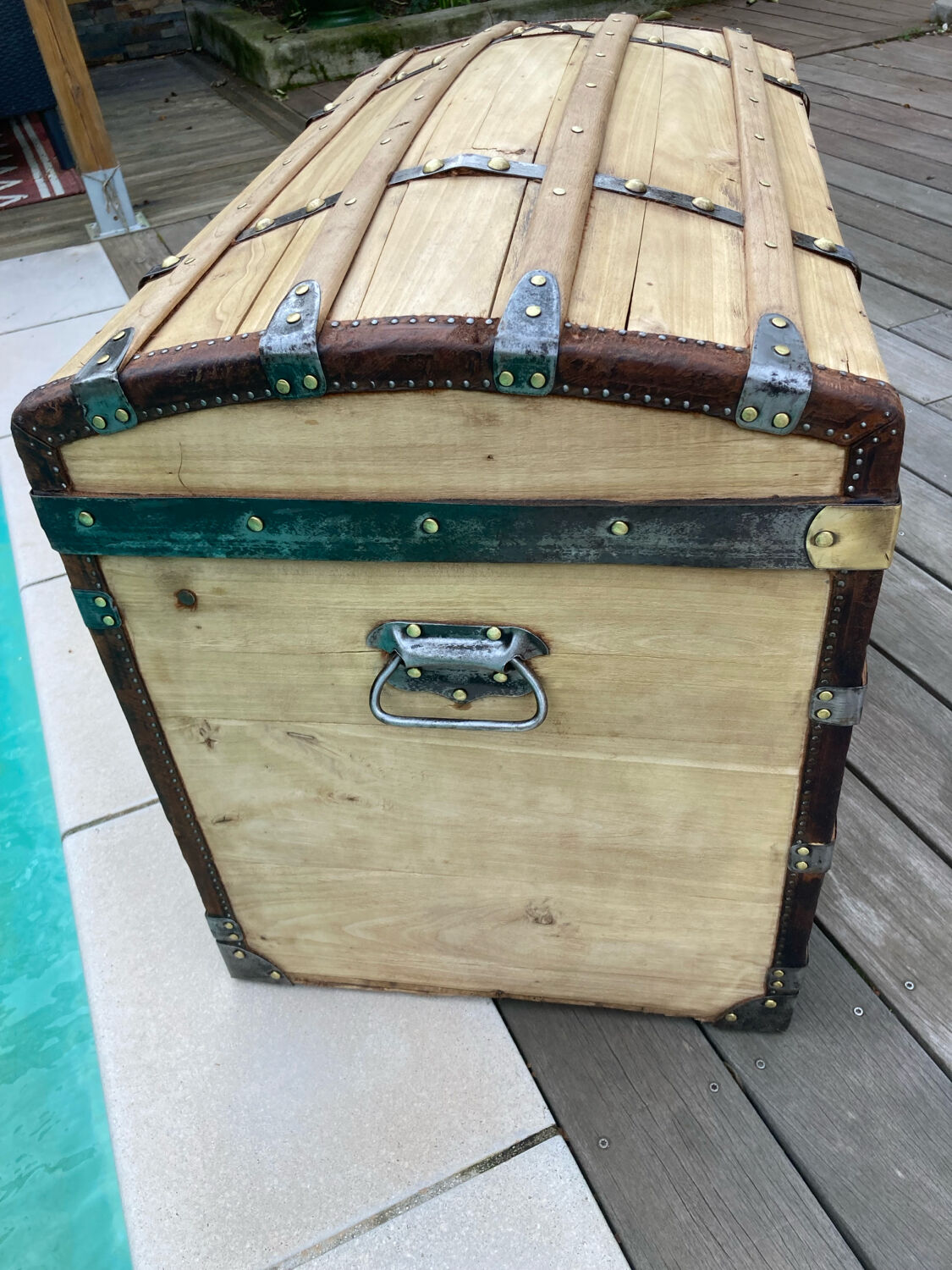 Exceptional curved leather/brass box with beautiful restored clasps.