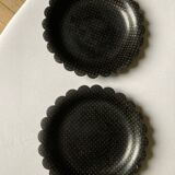 Two undersides of Napoleon III bottles in boiled cardboard
