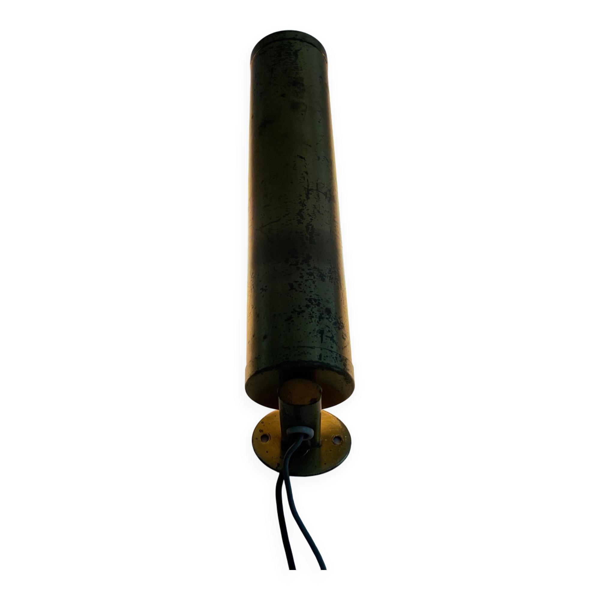 Small simple cylindrical brass wall light from the mid-century, 1950s, Germany.