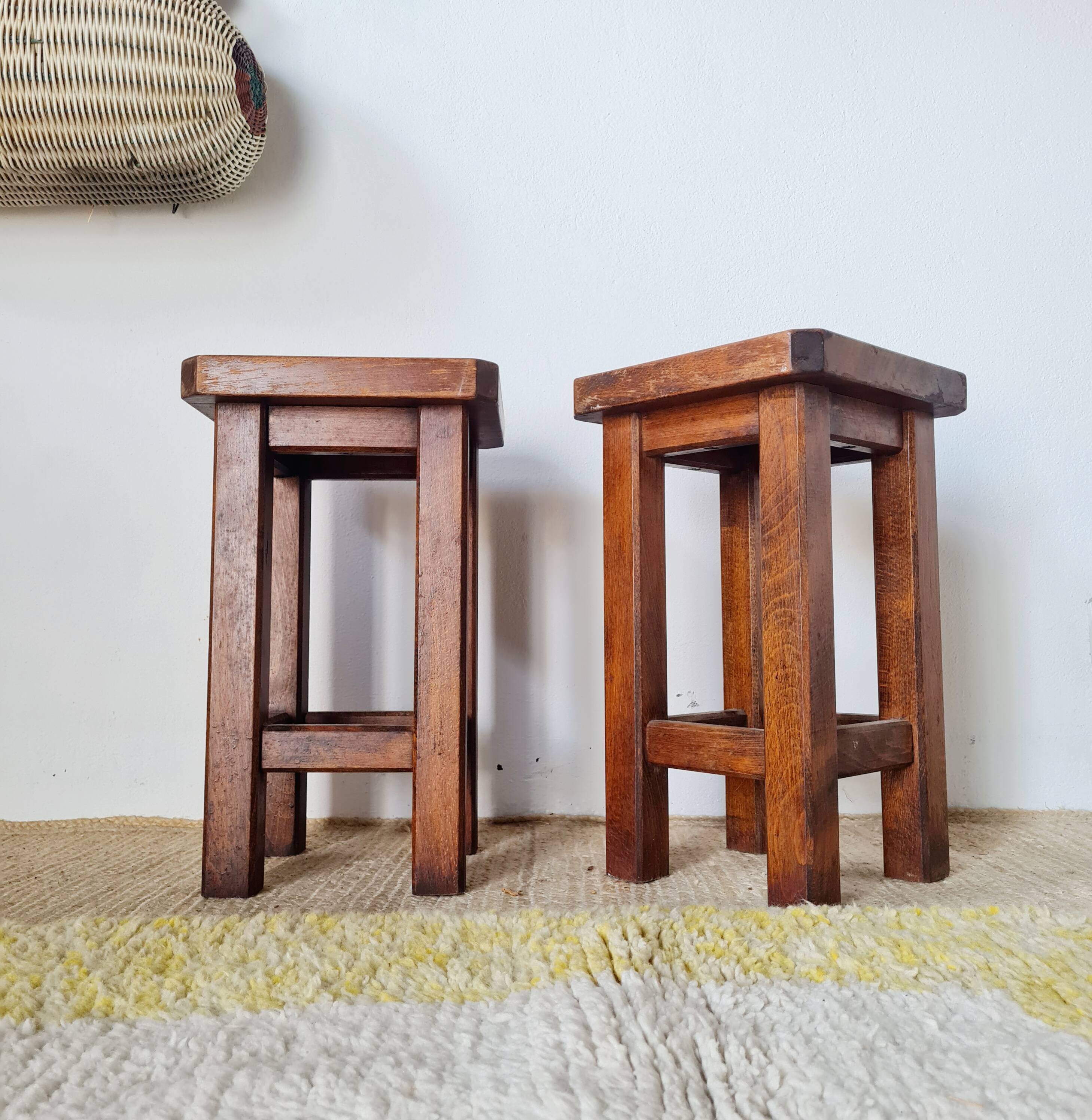 Pair of brutalist wooden stools, bedside tables.