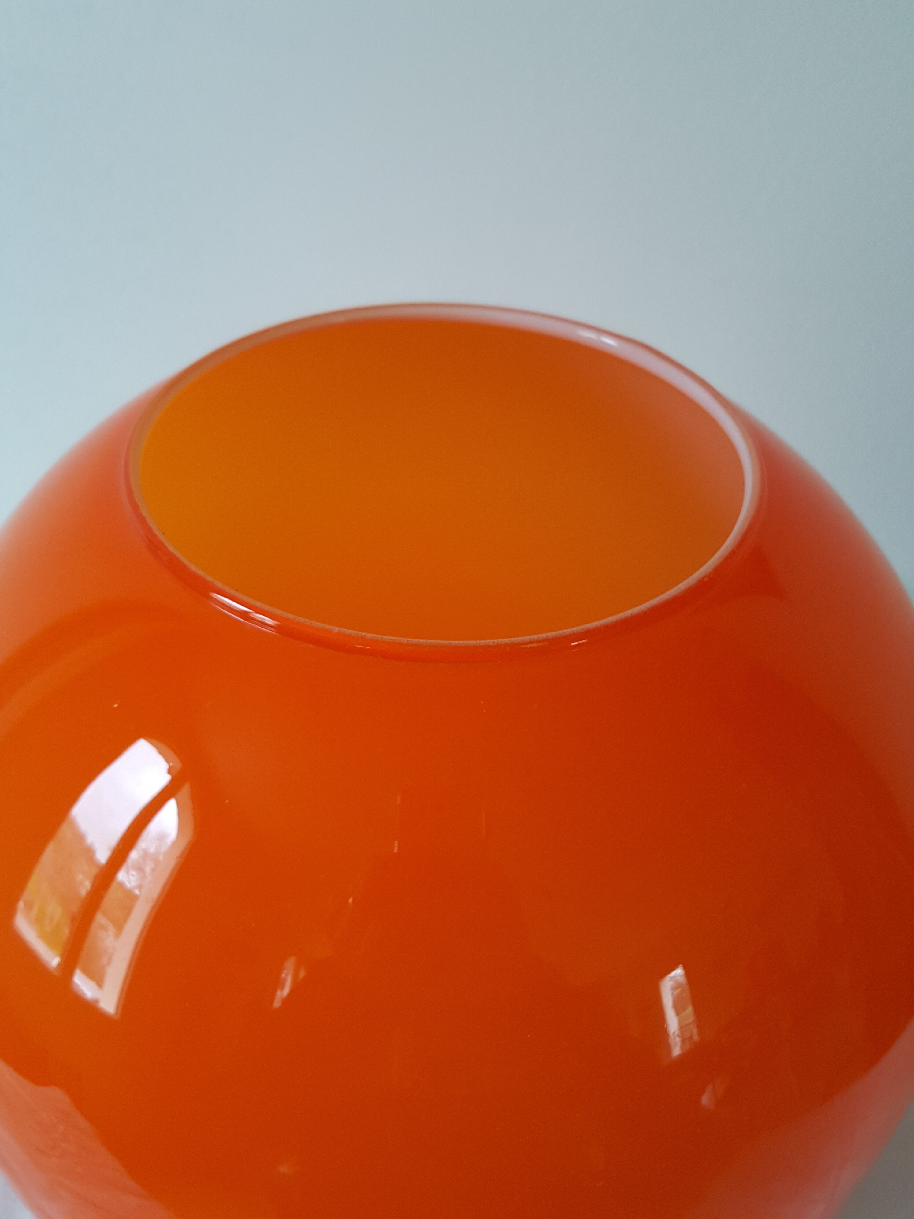 Orange glass globe for hanging lamp