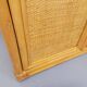 Vintage storage unit in rattan and woven rattan from the 1970s.