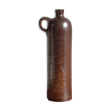Enamelled brown sandstone bottle with handle
