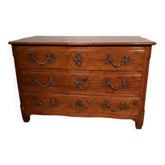18th century curved chest of drawers.