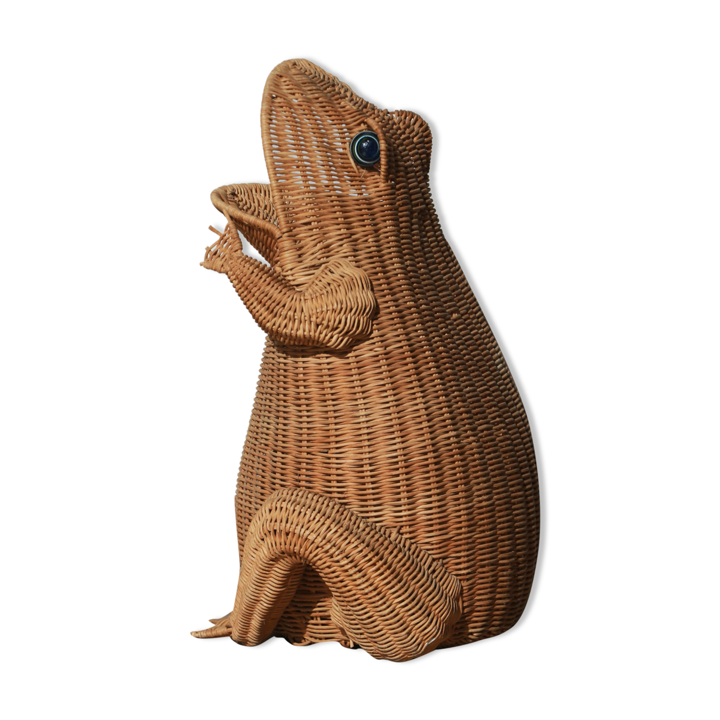 Wicker frog magazine rack by Olivier Cajan