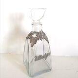 Whisky decanter decorated in tin