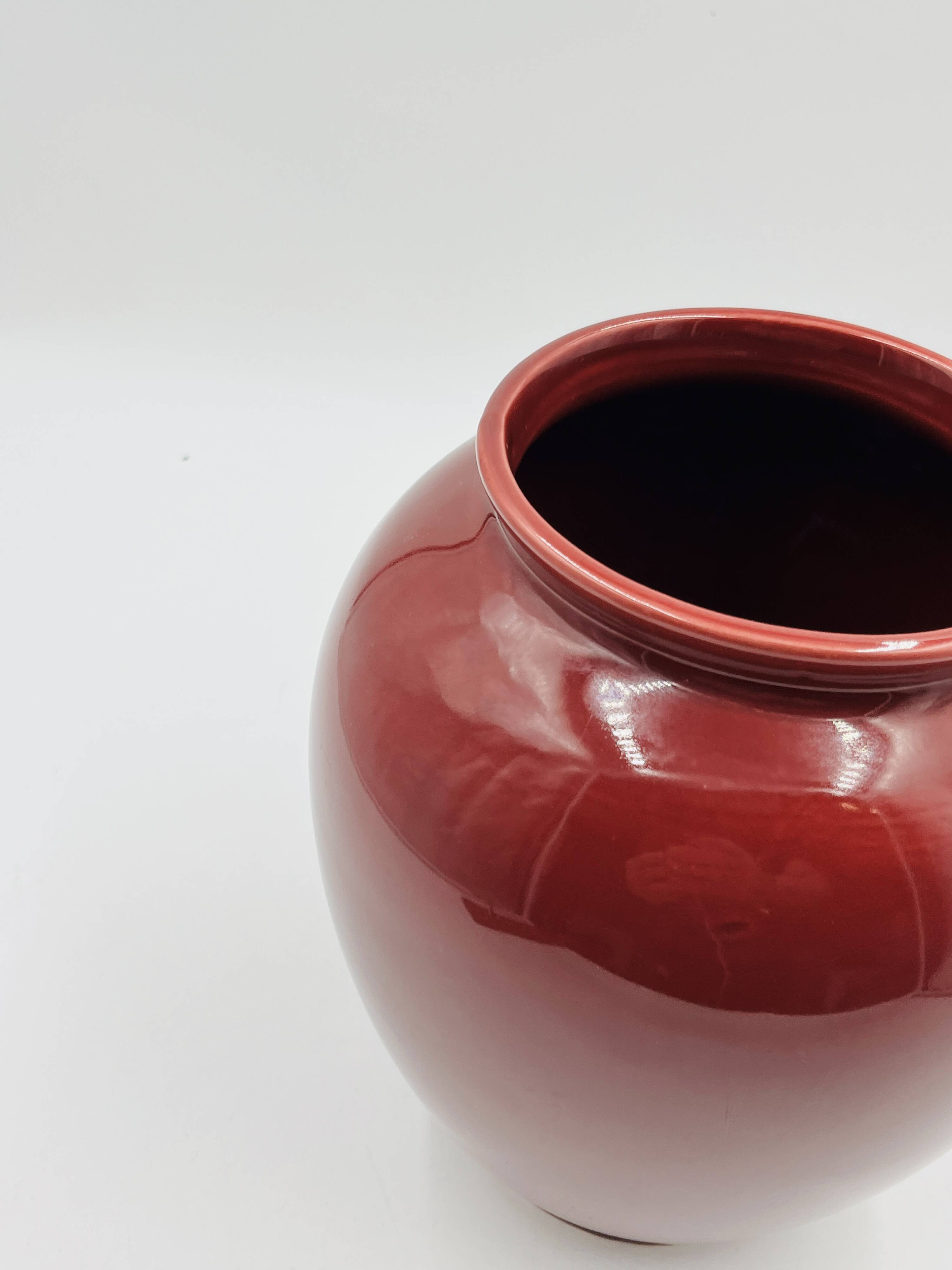 Vintage vase in glazed burgundy ceramic